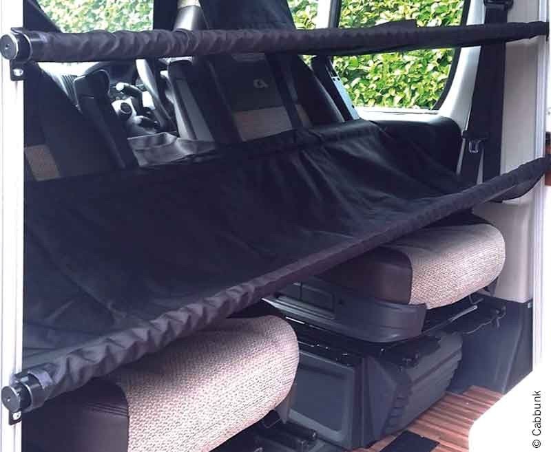 Patented cab bed system for swivel seats in the cab