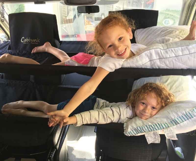 Patented cab bed system for cab swivel seats